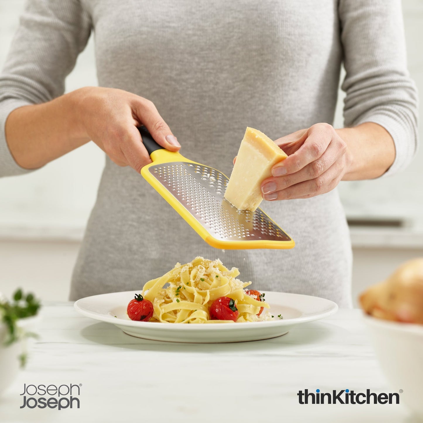 thinKitchen™ Joseph Joseph Multi-Grate Paddle Grater - Yellow