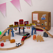 The Dino Land | Playbox The Dino Land | Third Set-1 Including (Police Jeep,1 Car,1 Boat,2 Dinosaurs,3 Stones,1 Signal,4 Plastic Attachment,12 Tracks and1 Large Bridge)