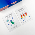 Two cards from a storytelling game with illustrations and text on a white surface.