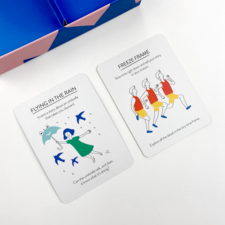Two cards from a storytelling game with illustrations and text on a white surface.