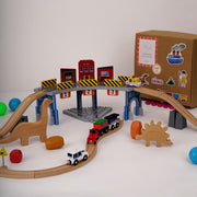 The Dino Land | Playbox The Dino Land | Third Set-1 Including (Police Jeep,1 Car,1 Boat,2 Dinosaurs,3 Stones,1 Signal,4 Plastic Attachment,12 Tracks and1 Large Bridge)