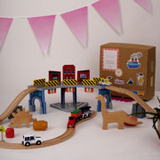 The Dino Land | Playbox The Dino Land | Third Set-1 Including (Police Jeep,1 Car,1 Boat,2 Dinosaurs,3 Stones,1 Signal,4 Plastic Attachment,12 Tracks and1 Large Bridge)